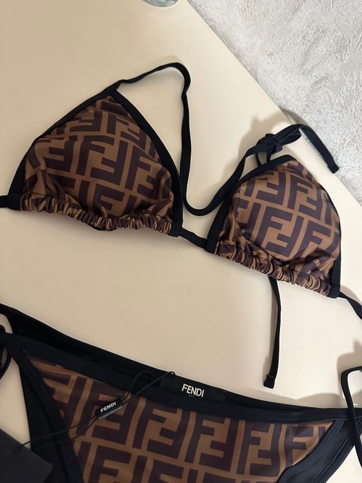 Купальники Prada