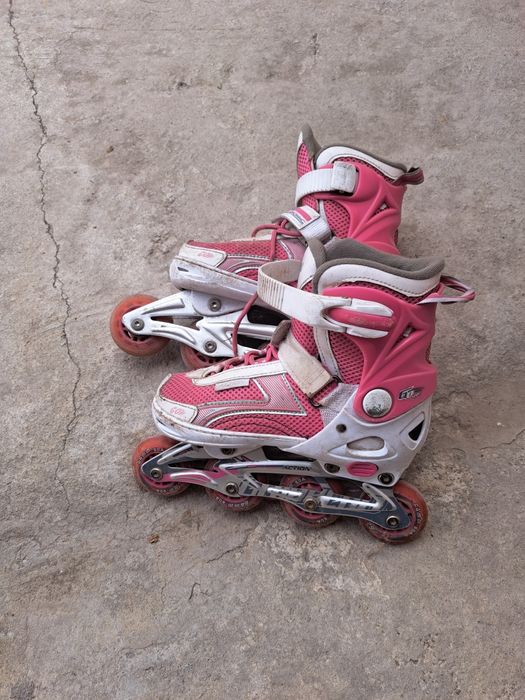 Роликовые коньки