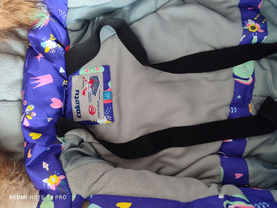 Продам зимний комбинезон на девочку