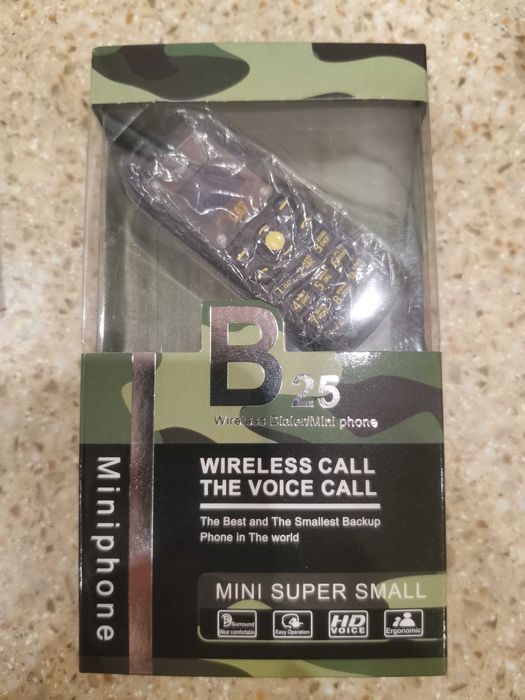 Компактный мобильный телефон