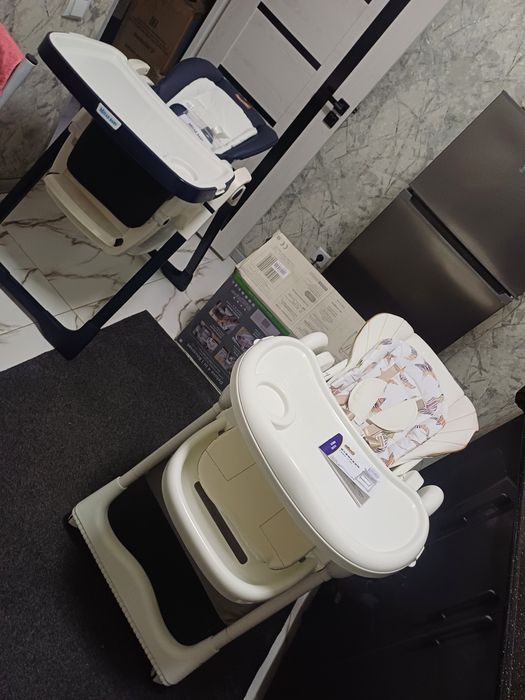 Продаётся фирменный кормления стульчики