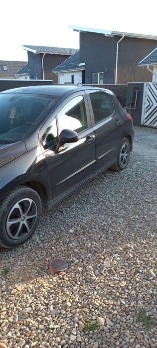 Văd peugeot 308 1.4 benzina
