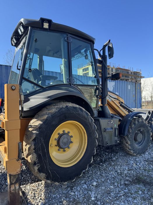 Buldoexcavator Case 580 ST 2019