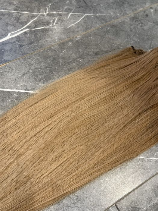 Продавам 4 реда екстеншъни от 100% естествена коса, закупени от Brilliant Hair Extensions.  Дължина 50 см, около 150 грама. Носена половин година.