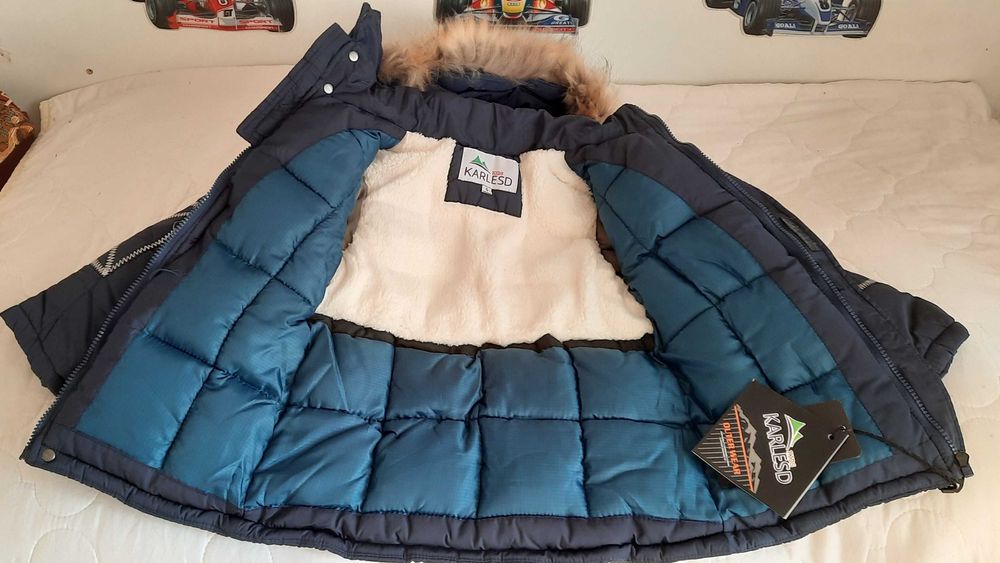 Продам новый пуховик зимний.