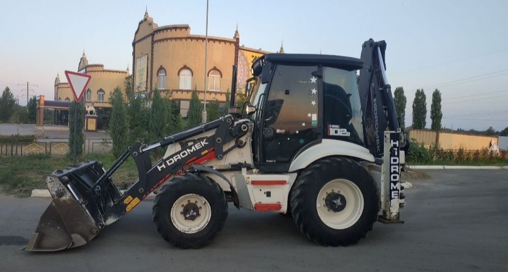 Услуги экскаватора погрузчика