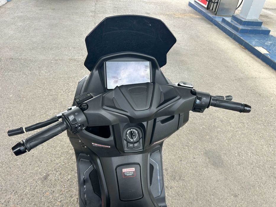 Скутер 125 кубика