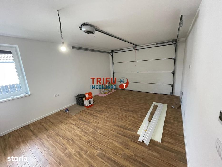 Casă pe un nivel cu garaj zona Centru