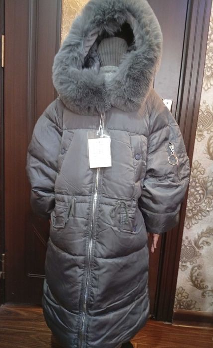 Женский пуховик .