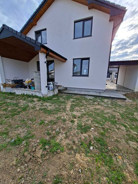 Casă nouă P+M în Mărtinești –cu 3 camere+living, parcare acoperita și teren 450mp