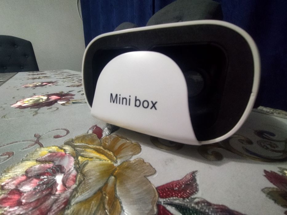 Продам Mini box без царапин