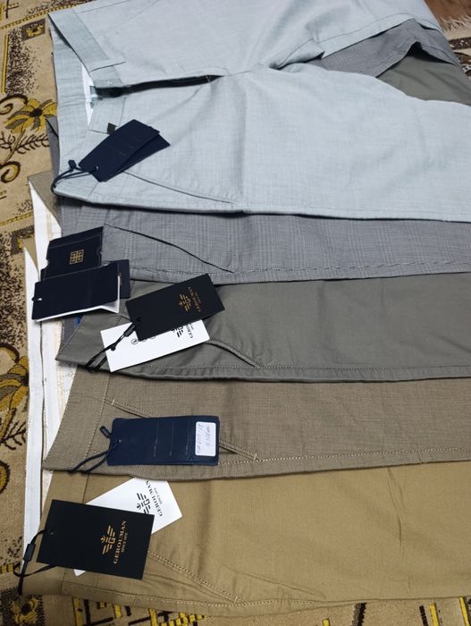 Продам новые брюки ,рубашки,костюм