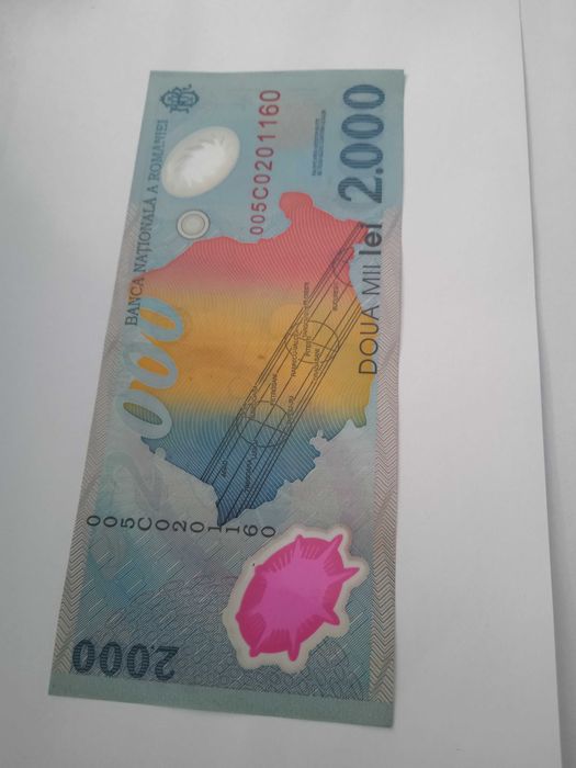 Bancnota de colecție, cu eclipsa, de 2000 lei, din 1999