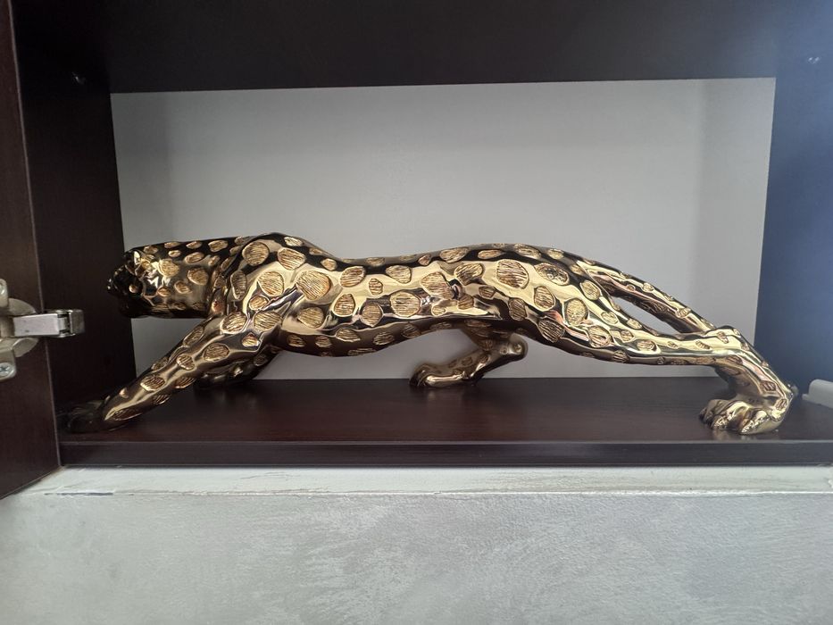 Золотая статуэтка леопард