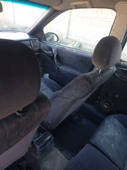 Машина Опел сатам