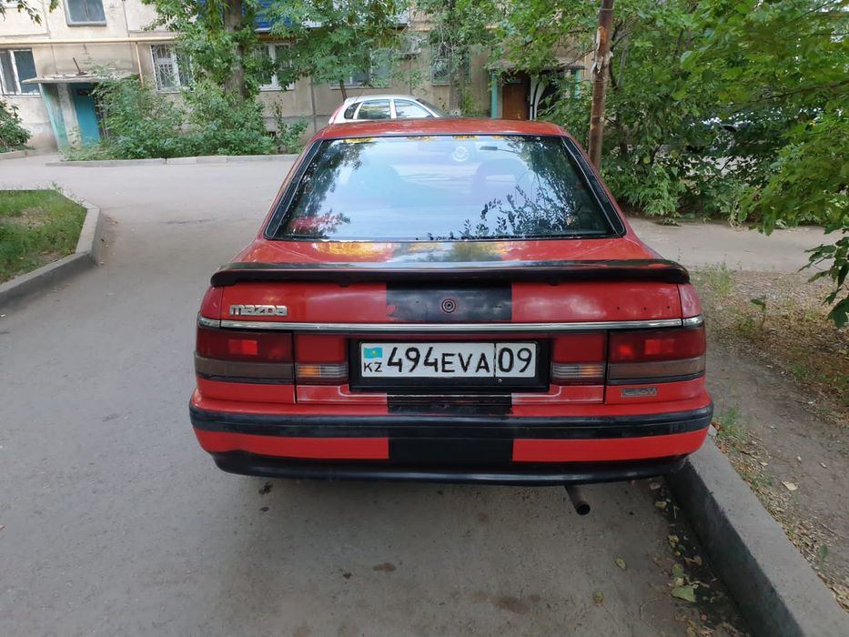 Машина Мазда 626