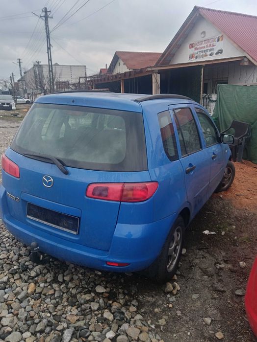 Vand mazda 2 capacitate motor 14