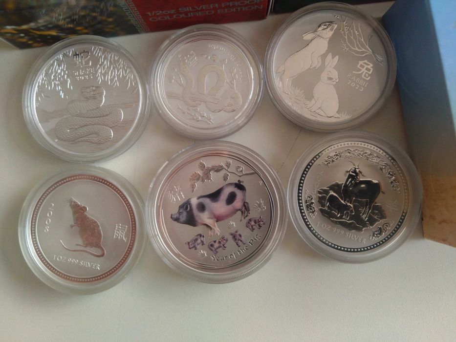 Сребърни монети от "Lunar series", 1 oz, 1/2 oz,Австралия