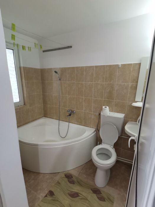 Inchiriez apartament cu 2 camere  in Bascov la curte