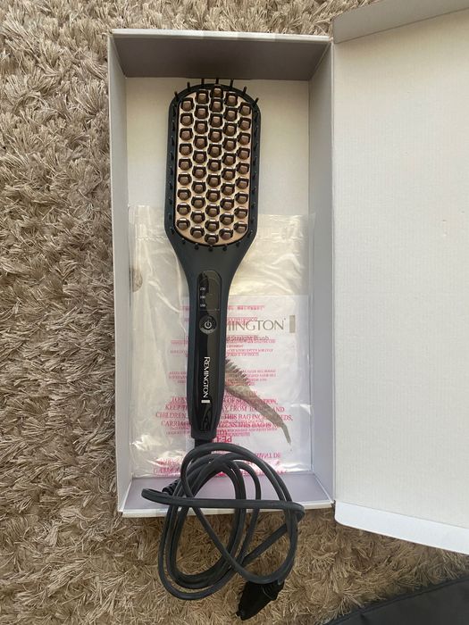 Четка за изправяне на коса