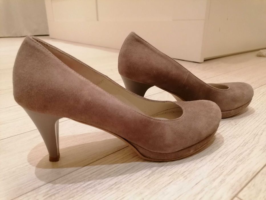 Елегантни естествена кожа практически нови