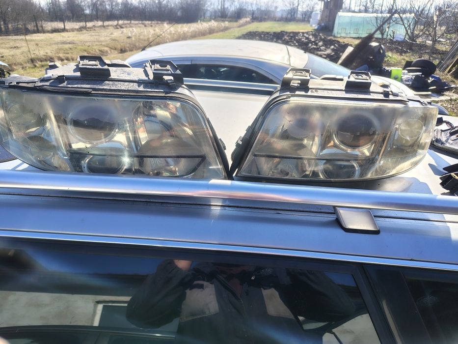 Faruri xenon Audi A6 C5 Oglinzi