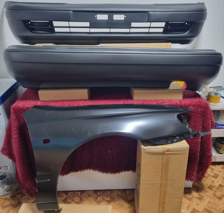 Карина Е бампера, фары, капот, крыло, решетка