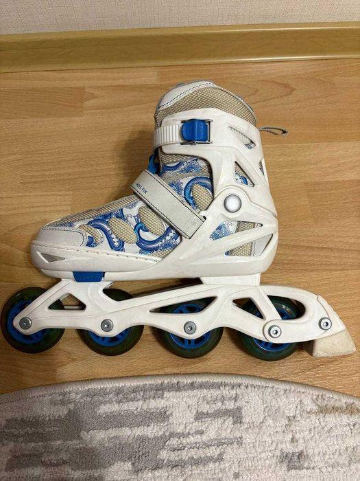 Роликовые коньки раздвижные.