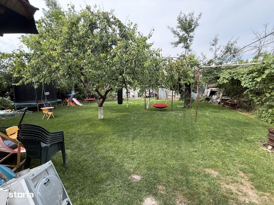 Apartament la curte comuna, 2 camere, 48 mp utili si teren comun 550 m
