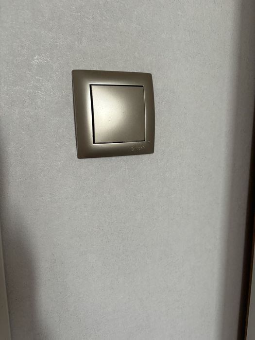 Выключатель серый матовый
