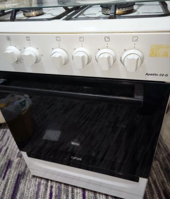 Продам газовую плиту бу,Artel