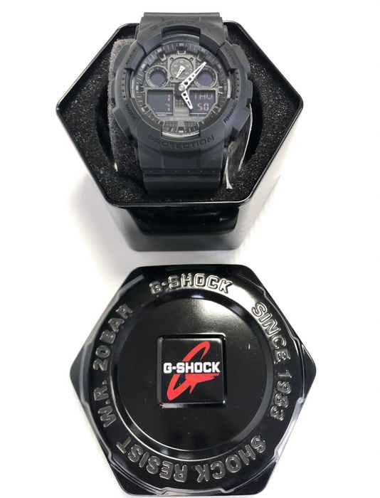 Мъжки часовник Casio G-SHOCK GA-100, черен, червен, внос от Германия