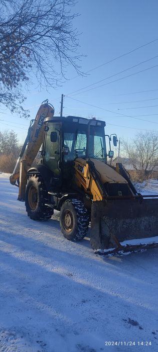 Услуги экскаватор-погрузчик