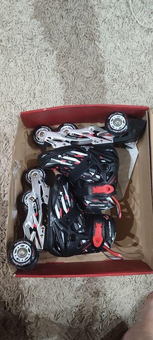 Роликовые коньки