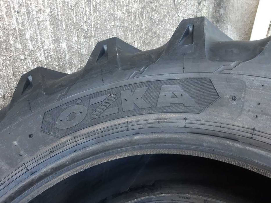 Marca OZKA 13.6-24 cu 8 pliuri cauciucuri noi pentru tractor