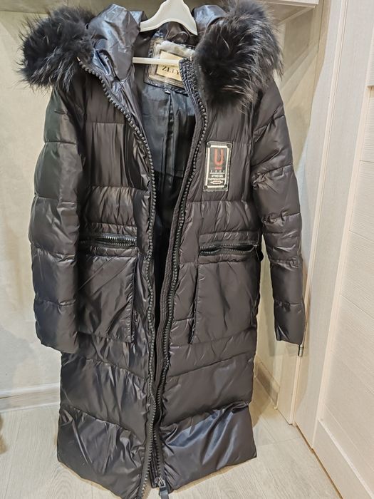 Продам зимний пуховик б/у