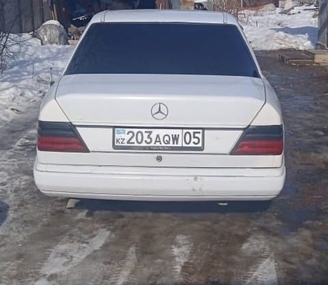 Мерседес Бенс 124