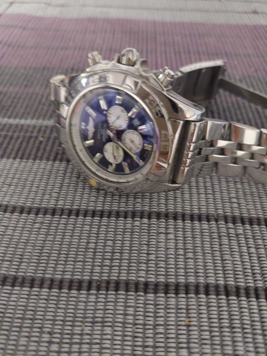 2 ceasuri barbatesti , unul Breitling si altul Slazenger