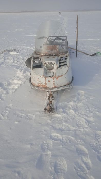 Снегоход буран на хорошем ходу