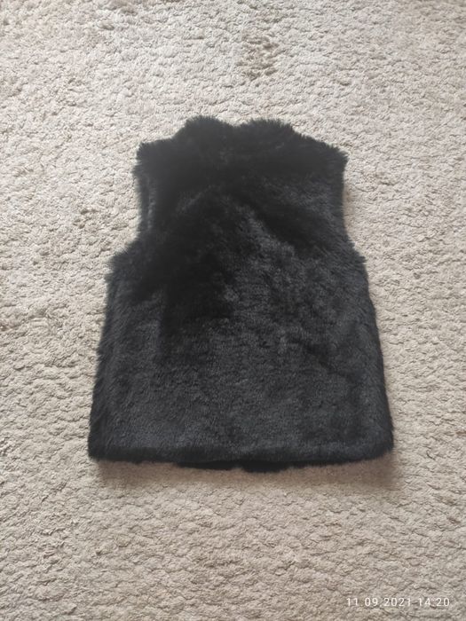 Меховая жилетка