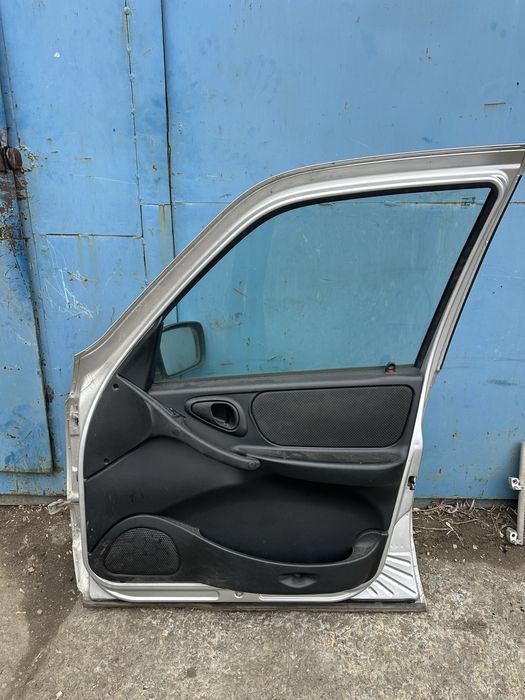 Дверь нива шевроле бертоне