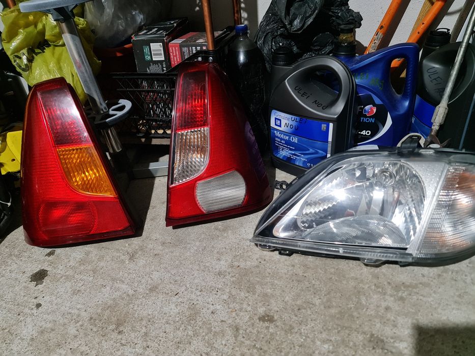 Faruri logan originale Elba (faza 1 ) și lampă spate