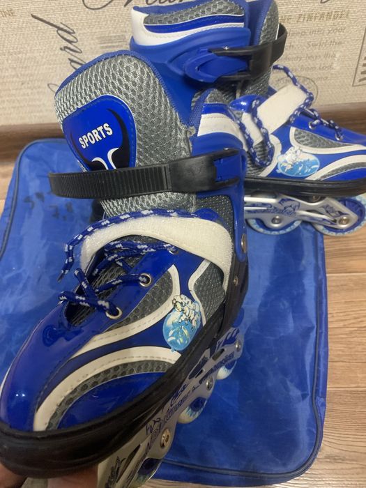 Роликовые коньки