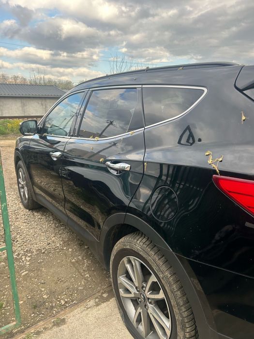 Aripă stânga spate Hyundai Santa Fe 2014