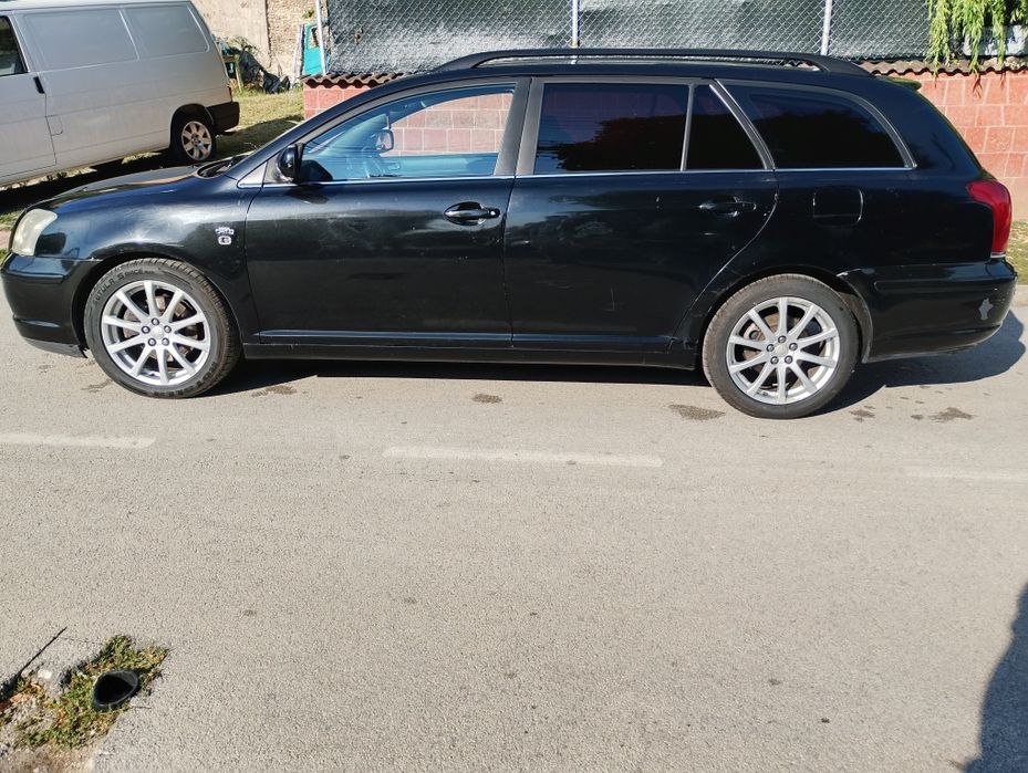 Тойота Авенсис .