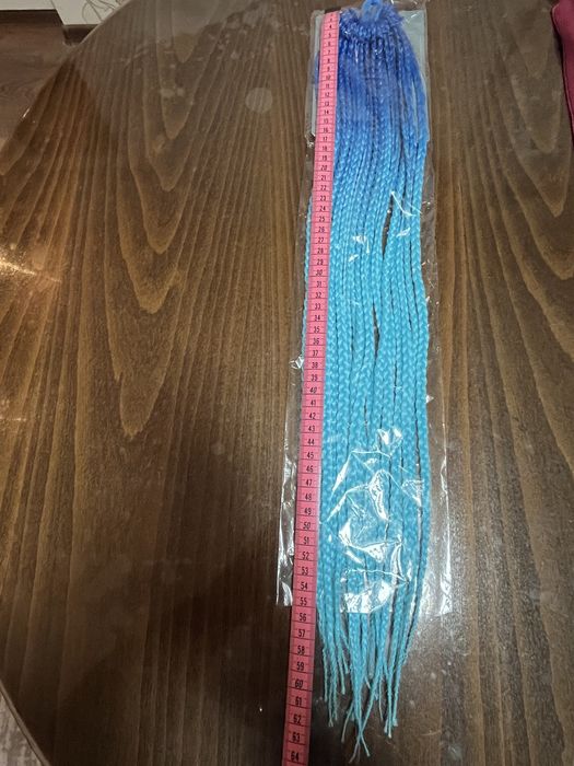 Красива дълга плитка от прежда