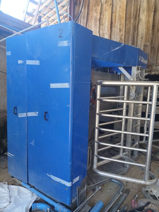 Роботи за доене на крави  Deleval