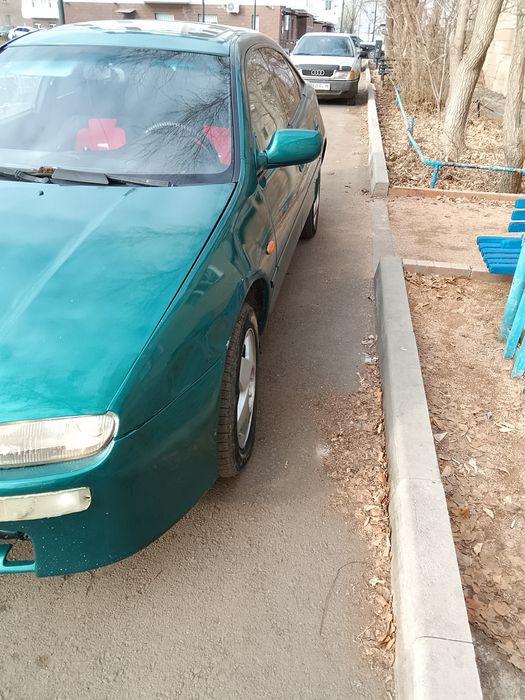 Автомобиль Мазда 323