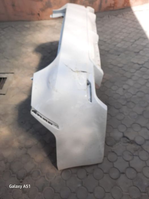 Задний бампер в оригинале Камри 75 SE