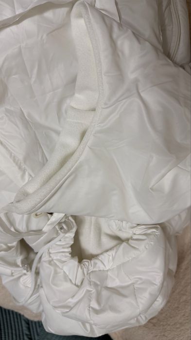 Продам новый комбинезон с конвертом